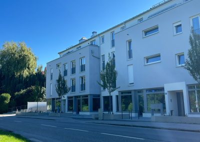 Neubau eines Wohn- und Geschäftshauses mit 15 Wohneinheiten, 3 Läden und TG